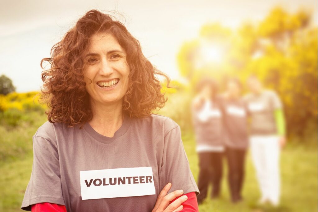 Woman with volunteer written on her t-shirt